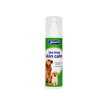 Johnson's Veterinary Tea Tree Skin Calm spray for dogs, with two dog photos; reads: soothes & calms itchy skin, anti-bacterial