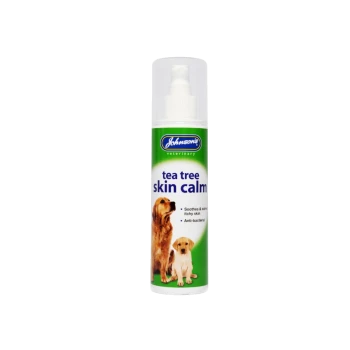 Johnson's Veterinary Tea Tree Skin Calm spray for dogs, with two dog photos; reads: soothes & calms itchy skin, anti-bacterial