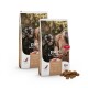 Zwei Beutel "pure sensitive senior" Hundefutter von Mera, mit einem lächelnden Hund auf der Verpackung, mit Futterstücken, die davor verstreut sind.
