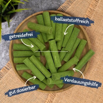 Schüssel mit grünen Snack-Sticks, beschriftet mit 'getreidefrei', 'ballaststoffreich', 'gut dosierbar', 'Verdauungshilfe'.