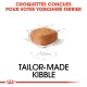 Image d'un morceau de croquette avec un contour esquissé, comportant le texte "CROQUETTES CONÇUES POUR VOTRE YORKSHIRE TERRIER" et "TAILOR-MADE KIBBLE."