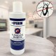 Weiße Flasche 'IPERON Flohschutz Shampoo' mit durchgestrichenem Insekten-Symbol auf einem Tisch in einer verschwommenen Küche.