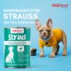 Bild von Dosen mit 'Nassfutter Strauß' Hundefutter. Merkmale: 100% natürlich, getreidefrei, Vitamine, hohe Qualität, hergestellt in Deutschland. Neugieriger Hund vorhanden.