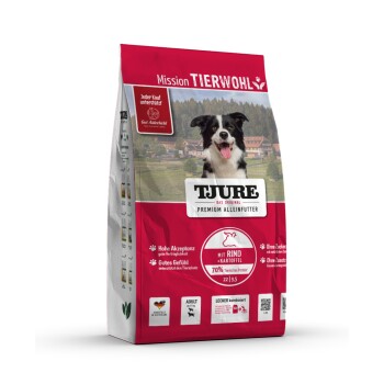 Hundefutterbeutel mit der Aufschrift "TJURE" und einem lächelnden Hund, mit "Premium Alleinfutter mit Rind" und "70% tierisches Protein."
