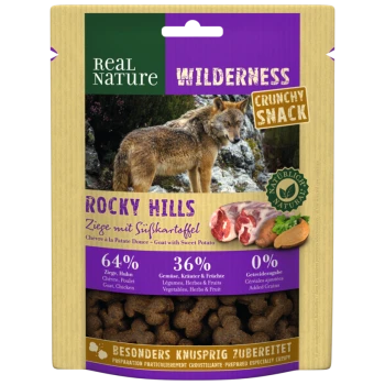 Haustier-Snackverpackung für "Real Nature Wilderness Crunchy Snack - Rocky Hills," mit einem Wolfshintergrund. Enthält 64% Ziege, 36% Gemüse, keine Körner.
