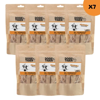 Sieben Pakete von DOGS'n TIGER Premium-Hundeleckerlis, mit einem Hund auf dem Etikett, das "99% Fleisch" und "Entenbrustfilet" angibt.