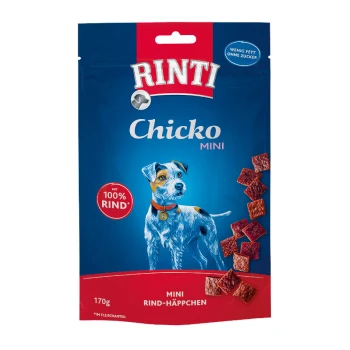 Emballage de friandises pour chiens Rinti Chicko Mini avec un fond bleu, un chien de dessin animé, et le texte "100% RIND" et "MINI RIND-HÄPPCHEN."