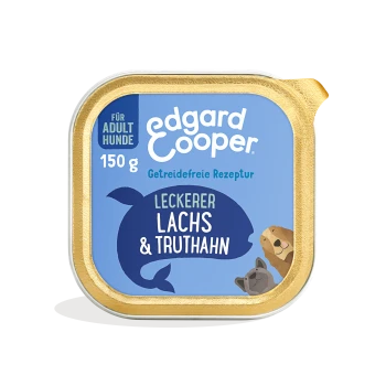 Edgard Cooper Hundefutterverpackung, 150g, mit blauem Hintergrund, Text 'Leckerer Lachs & Truthahn' und 'Getreidefreie Rezeptur'.