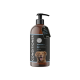 Braune Pumpflasche mit Hundespülung, beschriftet mit "Sensitiv Plus 02", mit einem glücklichen Hundebild und einem Etikett mit der Aufschrift "Für sensible Hunde & Welpen 500 ml".