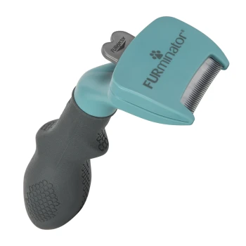 Outil de déshectage FURminator avec une tête turquoise et un manche ergonomique gris, conçu pour enlever les poils d'animaux lâches.