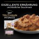 Teller mit Truthahn-Katzenfutter in Sauce neben einer Verpackung von "Purina Pro Plan Adult Delicate Digestion". Text: "Ausgezeichnete Ernährung und Geschmack."