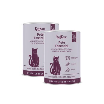 Zwei violette Dosen KatKare Pute Essential, gefriergetrocknete Truthahnsnacks für Katzen, mit Katzensilhouette und dem Text 'Snack good. Do good. Feel good.'