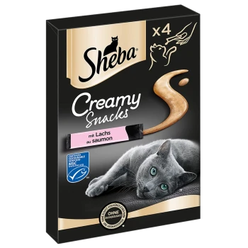 Sheba Creamy Snacks Verpackung mit einer grauen Katze, die liegt, mit einem lachsartigen Snack, der in Pink hervorgehoben ist.