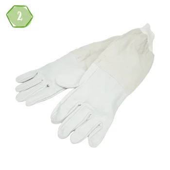 Weiße Haustierpflegehandschuhe mit einem Baumwollbund, entworfen für den sicheren Umgang mit Tieren.