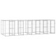 Ein großes, modulares Outdoor-Hundekennel aus Metalldraht, mit mehreren geschlossenen Abschnitten und Türen für einfachen Zugang.