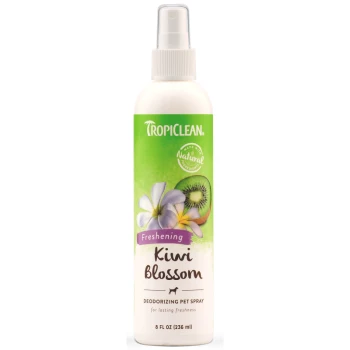 TropiClean Freshening Kiwi Blossom deodorizing pet spray bottle, 8 fl oz, featuring a green label with kiwi and flower graphics.