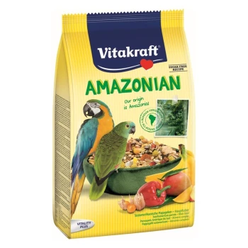 Heimatfutter Amazonian Amazonen 750g 750 g Vitakraft Amazonien Vogelfutterverpackung mit einem blauen und gelben Ara und einem grünen Wellensittich, mit einer Schüssel gemischter Samen und Früchte.