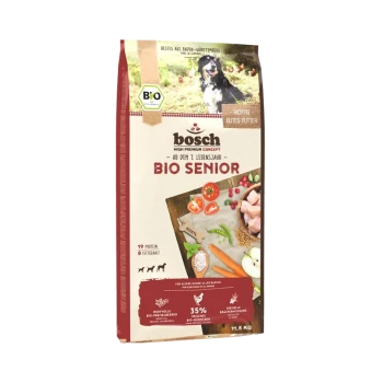 Bosch Bio Senior Hundefutterbeutel, mit einem schwarzen Hund auf der Vorderseite, mit Zutaten wie Gemüse und Fleisch.