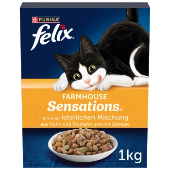 Une boîte de 1 kg de nourriture pour chats Purina Felix Farmhouse Sensations, présentant un chat noir et blanc joueur et un mélange de poulet, dinde et légumes.
