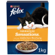 Une boîte de 1 kg de nourriture pour chats Purina Felix Farmhouse Sensations, présentant un chat noir et blanc joueur et un mélange de poulet, dinde et légumes.