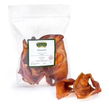 Schweineohren 500 g Eine durchsichtige Plastiktüte mit mehreren Schweineohren für Hunde, beschriftet mit "Masterfeed Schweineohren" mit sichtbaren Nährwertangaben und Zutaten.