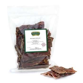 Dörrfleisch Platten 20 cm 500 g Getrocknete Fleischleckerlis für Hunde in einer durchsichtigen Tüte, beschriftet "Masterfeed Premium," mit Nährwertinformationen und Zutaten aufgelistet.