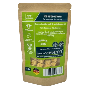 Friandises pour chiens Käsebrocken dans un sac en papier brun de 50g, avec un texte vert mettant en avant des ingrédients végétariens, sans gluten et 100% fromage.
