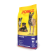 Hundefuttertüte mit der Aufschrift 'JOSI DOG ACTIVE', die Bilder von drei Hunden (einem Belgischen Malinois, einem Rottweiler und einem Mischling) zeigt.