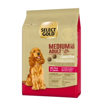 Gold Medium Adult dog food bag (11-25 kg) labeled "Sensitive," featuring a dog and text "Mit Pferd & Tapioka."
