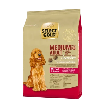 Zak Gold Medium Adult hondenvoer (11-25 kg) gelabeld "Sensitive," met een hond en de tekst "Mit Pferd & Tapioka."