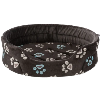 Rundes Haustierbett in Schwarz mit bunten Pfotenabdruckmustern in Blau und Grau, mit einem plüschigen, gepolsterten Innenraum.