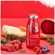 Eine Flasche SmoothieDog Immunio Immun Boost Snack für Hunde, umgeben von frischen Zutaten wie Apfel, Rübe, Kokosnuss und Himbeeren.
