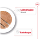 Haustierfutter auf einem weißen Teller, in Scheiben geschnitten, mit Text, der "Leichtverdauliche Nährstoffe" und "Vitamincomplex" hervorhebt.
