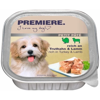 Hundefutterverpackung mit einem lächelnden Hund und dem Text "PREMIERE. Ich liebe meinen Hund" und "reich an Truthahn & Lamm."
