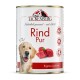 Dose Tackenberg Hundefutter mit Rindfleischstücken, einem glücklichen Golden Retriever und Text „Rind Pur“ und „Ergänzungsfutter“.