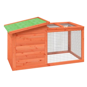Holzhaustierhaus mit grünem, schrägem Dach und einem Drahtgittergehege auf einer Seite, ideal für kleine Tiere.