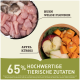 Bild von Haustierfutter-Zutaten mit rohem Hähnchen, wildem Flunder, Apfel und Kürbis. Text hebt "65% hochwertige tierische Zutaten" hervor.