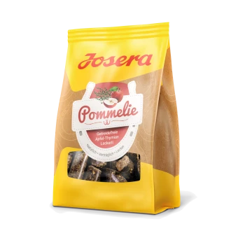 Josera Pommelie getreidefreie Apfel-Thymian-Haustierleckerlis in einer gelb-braunen Tüte mit sichtbaren Pellets.