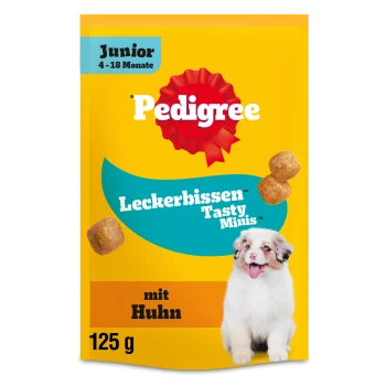 Gelbe Pedigree Junior Leckerli-Tüte mit der Aufschrift 'Leckerbissen Tasty Minis, mit Huhn, 125 g' mit Welpen und Kroketten.