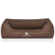 Braunes Hundebett mit einem gerippten Innenraum und einer glatten Außenseite, das das Logo "KNUFFELWUFF" auf der Vorderseite trägt.
