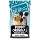 A bag of Burns Puppy Original dog food featuring a golden retriever and a black and white puppy on the front, labeled "PUPPY ORIGINAL CHICKEN & RICE."