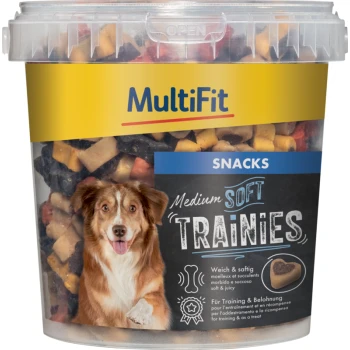 A clear plastic container of MultiFit Medium Soft Trainies dog snacks, featuring a smiling dog on the label, with colorful treats visible inside.
