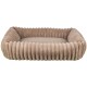Ein plüschiges, rechteckiges Haustierbett mit weichem, beigem Stoff und erhöhten, gepolsterten Rändern für Komfort.