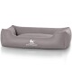 Graues Hundebett mit erhöhten Rändern und einem weißen "KNUFFELWUFF"-Logo auf der Vorderseite, entworfen für den Komfort von Haustieren.