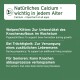 Grünes Tieretikett: 'Natürliches Calcium' – 'Calcium – wichtig in jedem Alter'; erwähnt Welpen/Kätzchen, Trächtigkeit, Senioren.