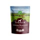 Hundefutterverpackung mit der Marke "Irish Pure", beschriftet mit "Adult. Sensitiv. Weiderind & Freiland-Huhn mit Gemüse & Kelp-Alge," mit 65% Fleischanteil.