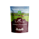 Hundefutterverpackung mit der Marke "Irish Pure", beschriftet mit "Adult. Sensitiv. Weiderind & Freiland-Huhn mit Gemüse & Kelp-Alge," mit 65% Fleischanteil.