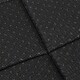 Close-up of a textured black pet mat featuring a diamond pattern with small raised dots for grip and comfort.