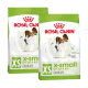 Deux sacs de nourriture pour chiens Royal Canin X-Small pour adultes, adaptés aux chiens jusqu'à 4 kg, présentant un chien Papillon sur l'emballage.
