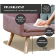 Ein rosa Sofa mit zwei türkisfarbenen Kissen steht auf einem Holzboden, begleitet von einem schwarzen Stuhl und einer pflanzenmotivierten Wandkunst darüber.